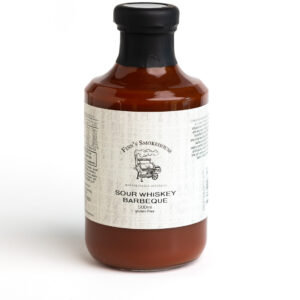 500ml glass bottle of Finn's Smokehouse Sour Whiskey Barbeque sauce with a beige label and black cap
