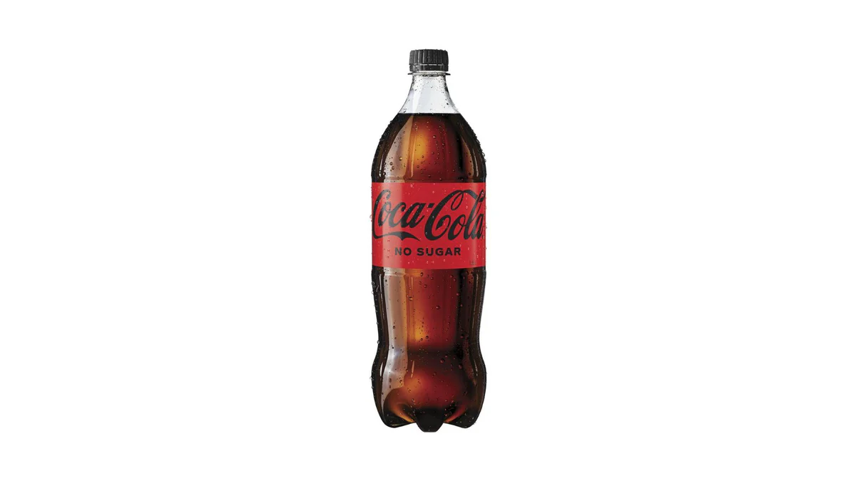 Coca-Cola No Sugar 1.25L bottle with red/black label and surface condensation.