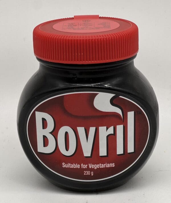 Bovril Vegetarian Version Jar Bovril jar with red lid, labeled "Suitable for Vegetarians," 230 grams.