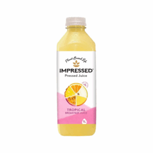 1-liter bottle of Impressed Pressed Juice Tropical Breakfast with tropical fruit images and plant-based label.
