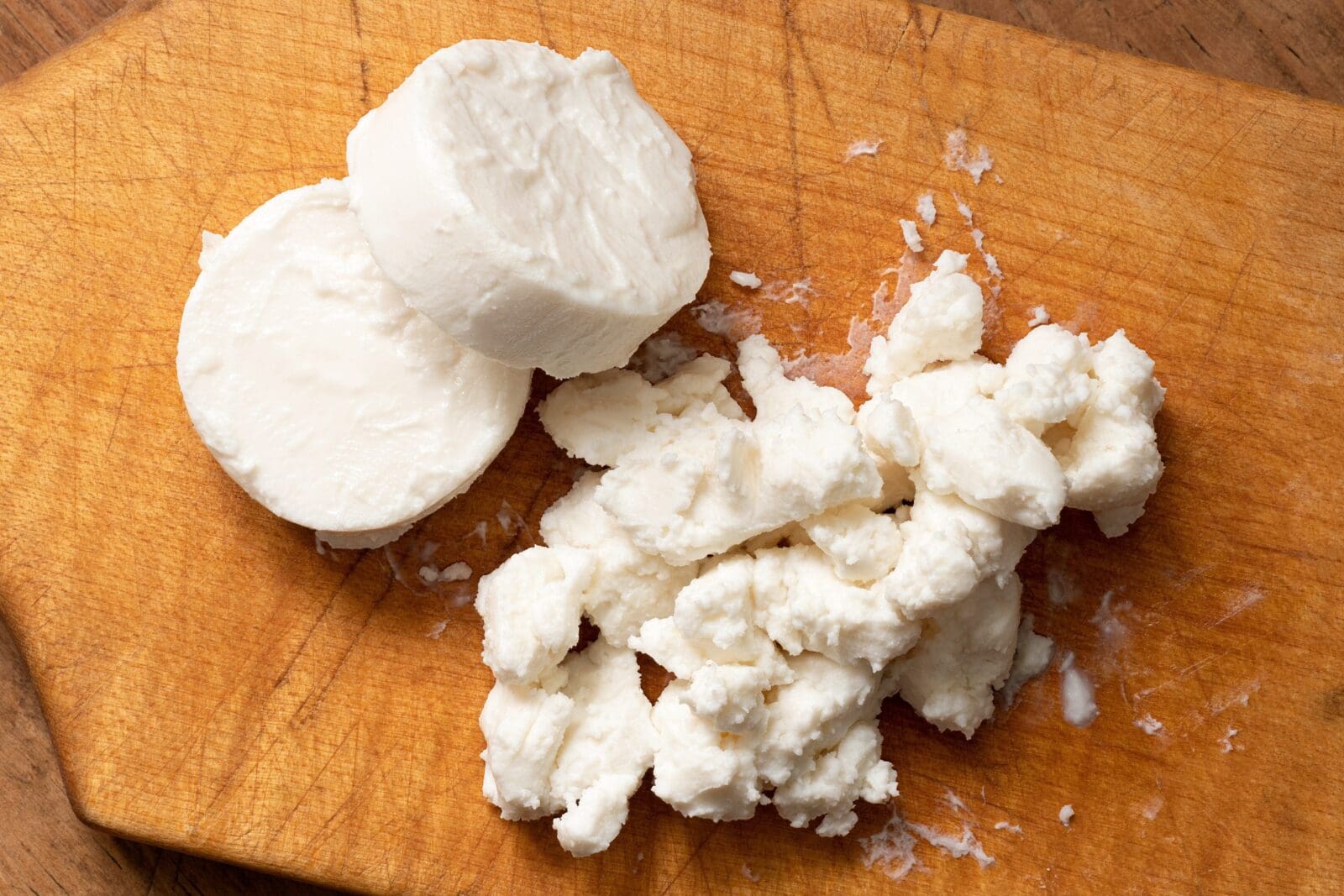 Two,Rounds,Of,Goat,Cheese,And,Crumbled,Goat,Cheese,On