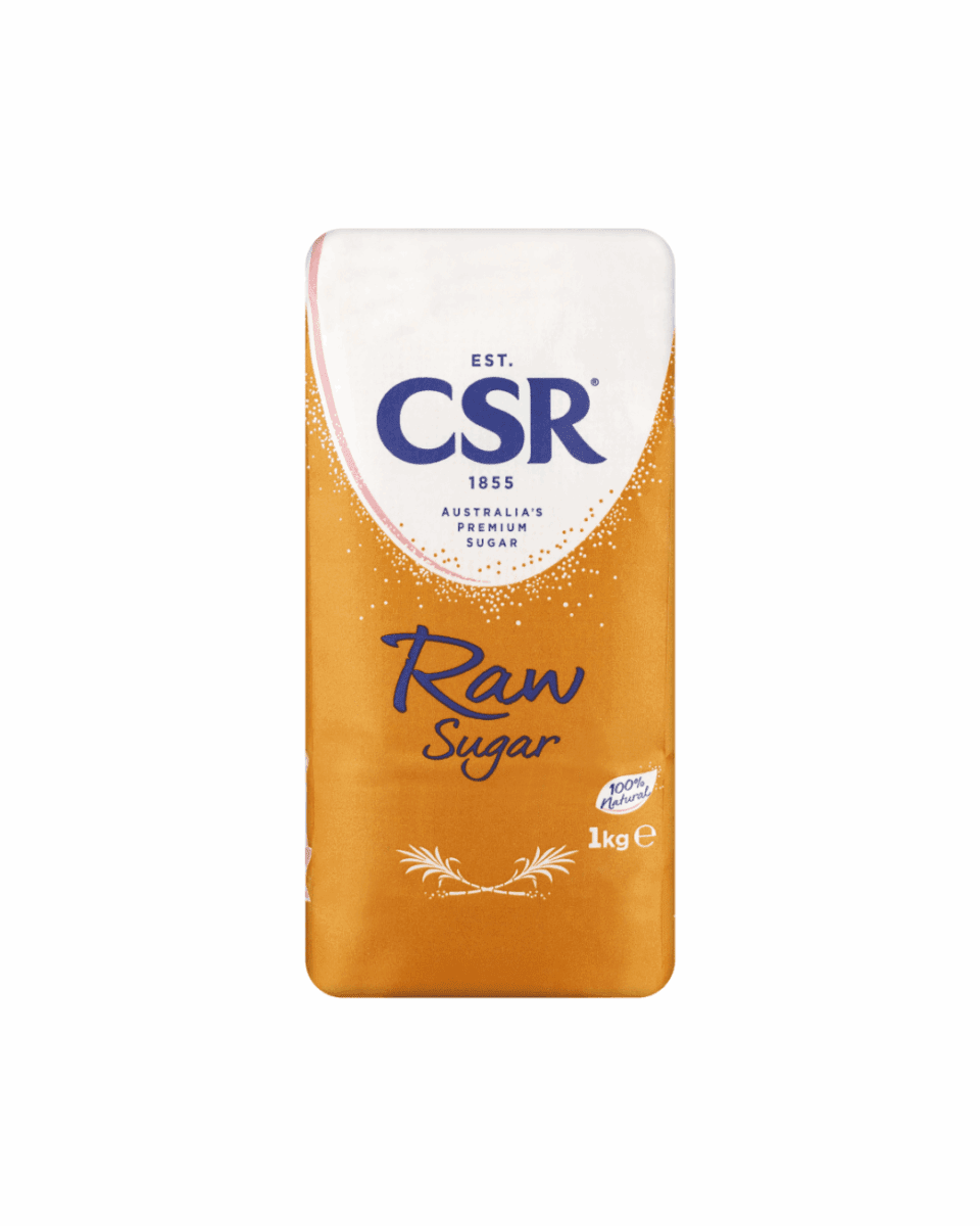 1kg package of CSR raw sugar, orange with blue accents, labeled 100% natural.