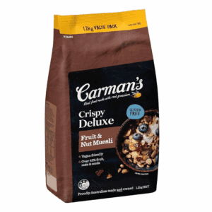 Carman's Deluxe Gluten Free Muesli bag, brown, 1.12 kg, with nuts and berries depiction.