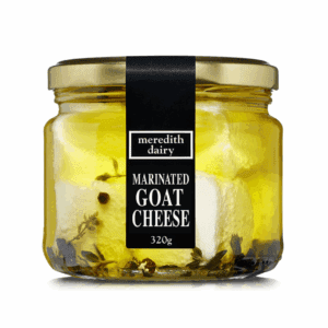 Jar of 320g goat cheese marinated in olive oil with garlic, thyme, and peppercorns.