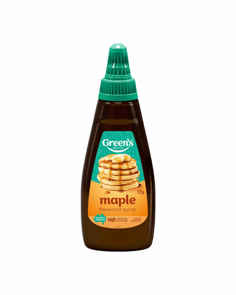Bottle of Green's maple-flavored syrup, green cap, blueberry pancakes on label, 375g.