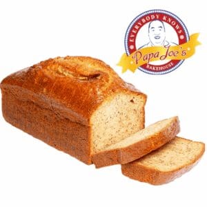 Loaf of banana bread with slices cut, Papa Joe's Bakehouse logo visible.