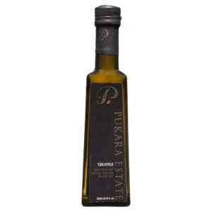 Dark brown glass bottle labeled "Pukara Estate" with truffle-flavored olive oil, 250ml.