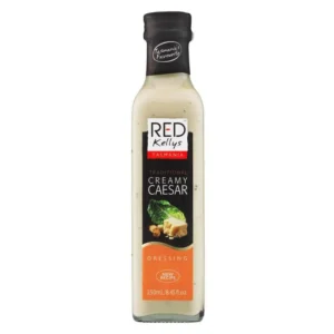 250ml Red Kellys Tasmania Creamy Caesar dressing, black cap, lettuce, and croutons on label.