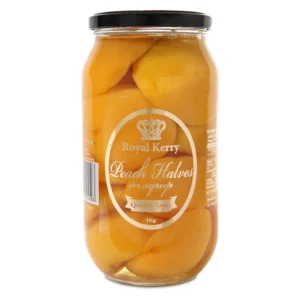 Glass jar of Royal Kerry peach halves in syrup weighing 1 kg with a black lid.
