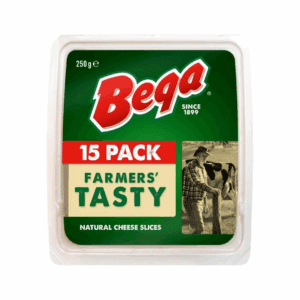 Bega Farmers' Tasty natural cheese slices, 250g, 15 slices, farmer and cow image on lid.