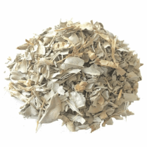 Pile of muted green, dried eucalyptus leaves and stems for herbal use.