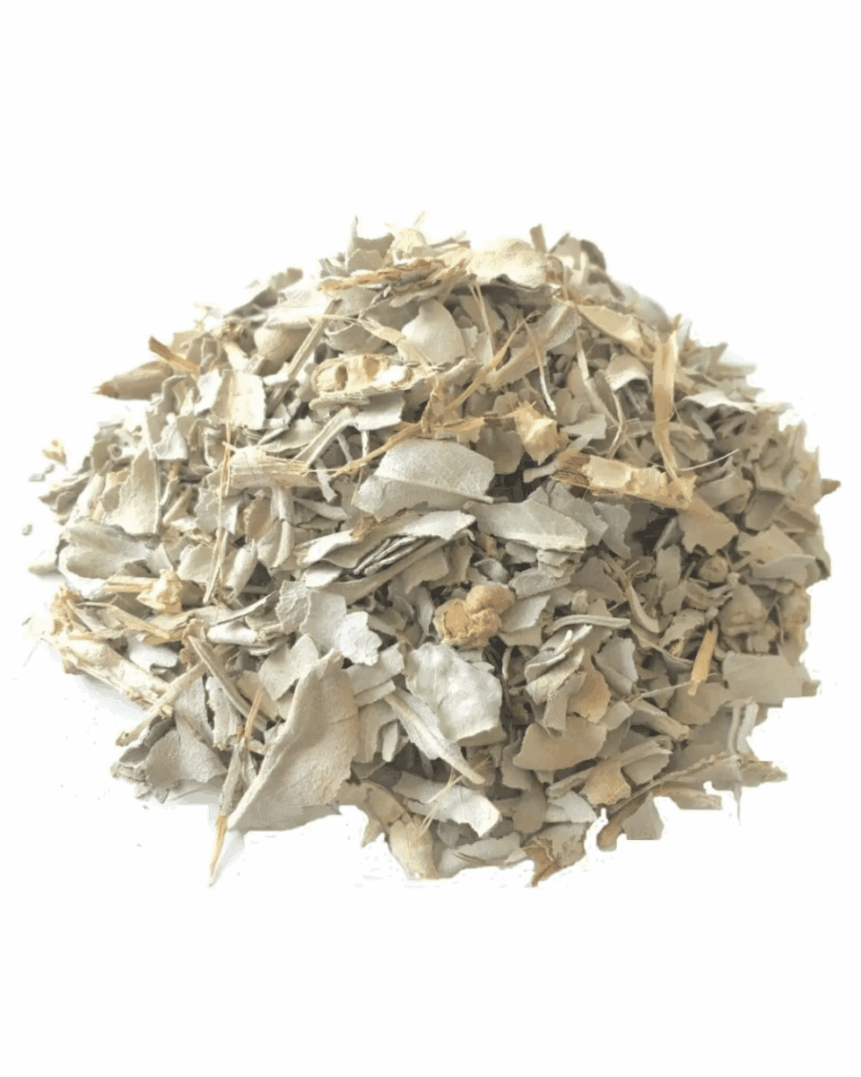 Pile of muted green, dried eucalyptus leaves and stems for herbal use.