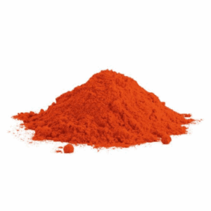 Bright orange powder mound on white background, finely ground and vibrant in color.