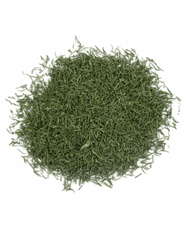 A pile of finely chopped dried dill leaves on a white background.