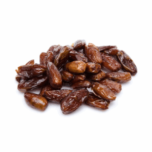 Glossy brown dates piled on a white background, shiny and whole.