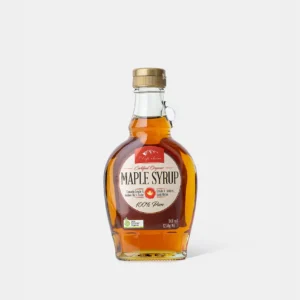 Organic Grade A Amber maple syrup bottle, gold cap, 189 ml, from Canada, plain background.
