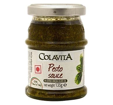 Jar of Colavita pesto sauce, 135g, made with extra virgin olive oil, labeled with basil image.
