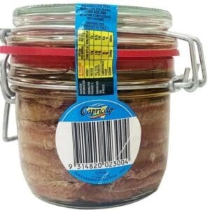 Glass jar with metal latch, red seal, preserves inside, blue label, barcode visible.
