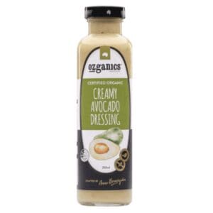 Bottle of Ozganics organic creamy avocado dressing, 350ml, with black cap and avocado images.