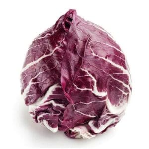 Radicchio head with deep red-purple leaves and white veins on a white background.