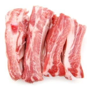Raw pork ribs with red meat and white fat, arranged parallel, indicating they are uncooked.