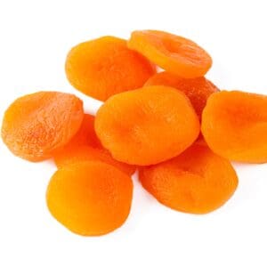Small pile of bright orange dried apricots on a plain white background.