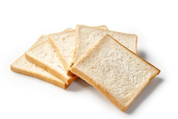 HOMESTYLE CLASSIC WHITE SLICED BREAD Five white bread slices fanned out on a white background.