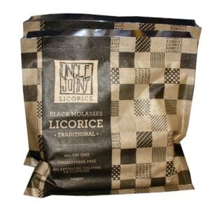 Package of Uncle John's black molasses licorice, 300g, 99% fat-free, checkered design.