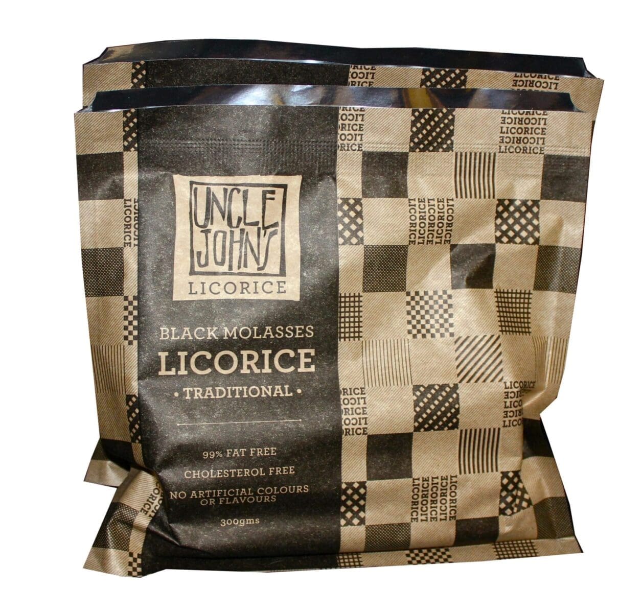 Package of Uncle John's black molasses licorice, 300g, 99% fat-free, checkered design.