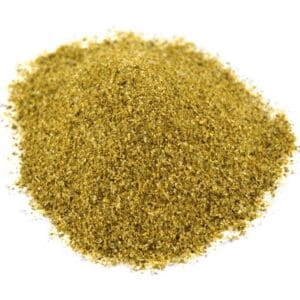 Small pile of finely ground, yellowish-green powder on a white background.